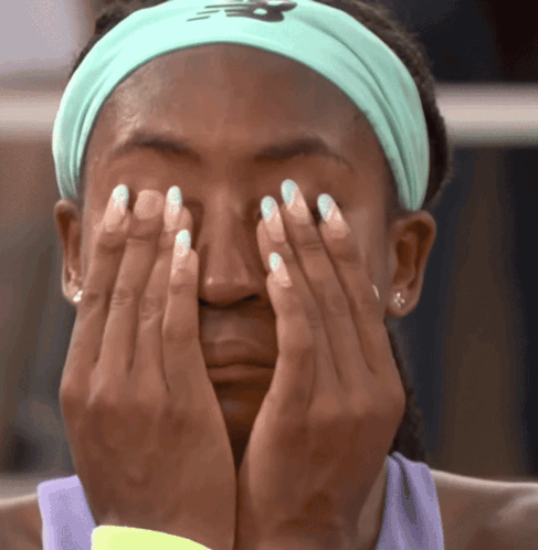 Woman in New Balance Headband Covering Face