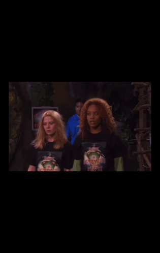 Woman in Ninja Turtles T-Shirt Next to Another Woman