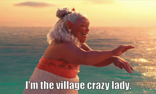 Woman in Ocean Saying I'm the Village Crazy Lady