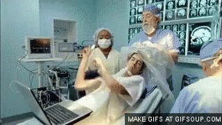 Woman in Operating Room With Laptop