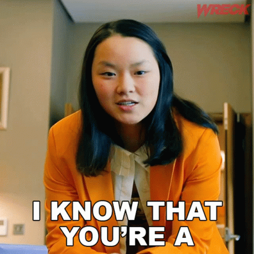 Woman in Orange Jacket Says I Know That You're A