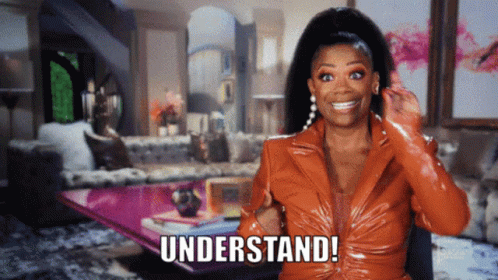 Woman in Orange Jacket Says Understand