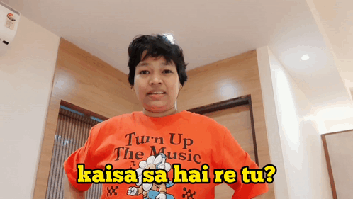 Woman in Orange Shirt Saying Turn Up the Music