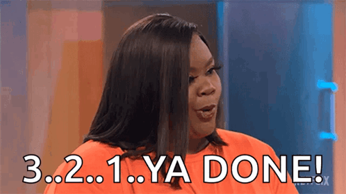 Woman in Orange Shirt Saying Ya Done