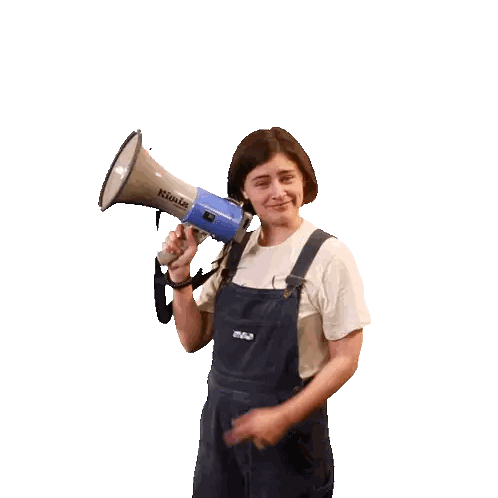 Woman in Overalls Holding Megaphone Sound