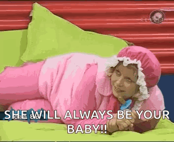 Woman in Pink Baby Costume Saying Always Be Your Baby