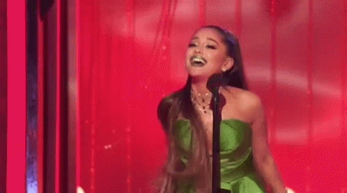 Woman In Pink Beside Woman In Blue GIF