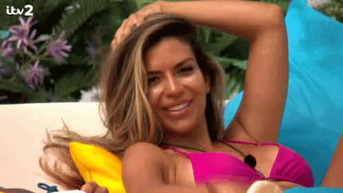 Woman In Pink Bikini On Couch Itv2 GIF