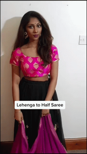 Woman in Pink Blouse and Black Skirt