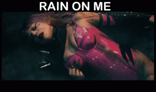 Woman In Pink Bodysuit Lying Down Rain On Me GIF