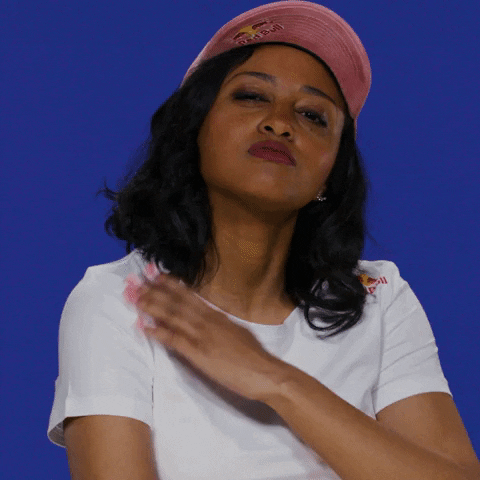 Woman In Pink Cap Continuous Shoulder Brush GIF