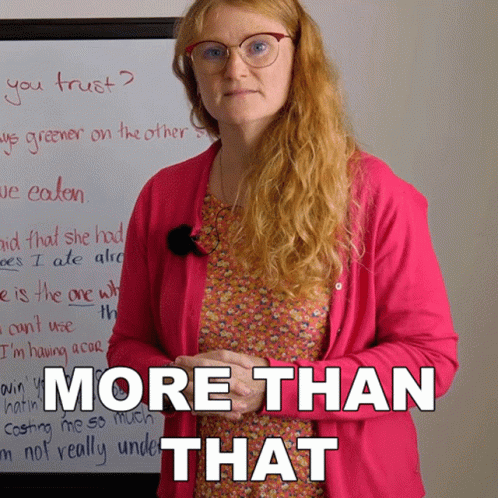 Woman in Pink Cardigan Whiteboard More Than That