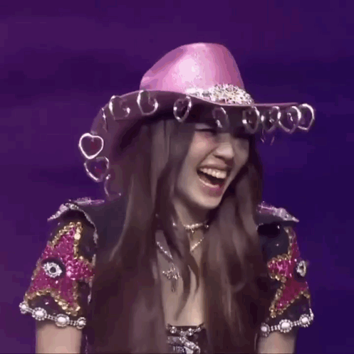 Woman In Pink Cowboy Hat With Hearts GIF