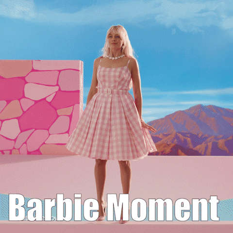 Woman in Pink Dress Barbie Moment
