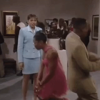 Woman in Pink Dress Dancing in Museum