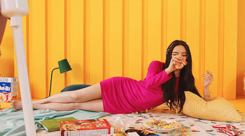 Woman in Pink Dress Eating Cereal