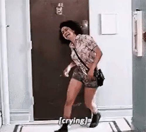 Woman in Pink Dress in Kitchen Saying Does Your Dress Have to Go Over Your Head