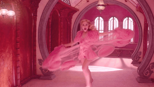 Woman In Pink Dress In Pink Room GIF