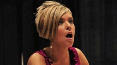 Woman in Pink Dress Making Funny Face