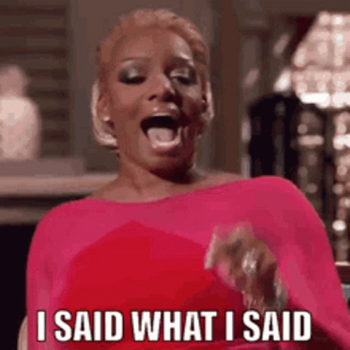 Woman in Pink Dress Making Funny Face Saying I Said What I Said