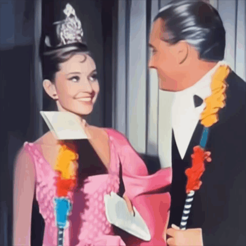 Woman in Pink Dress Man in Tuxedo Smiling