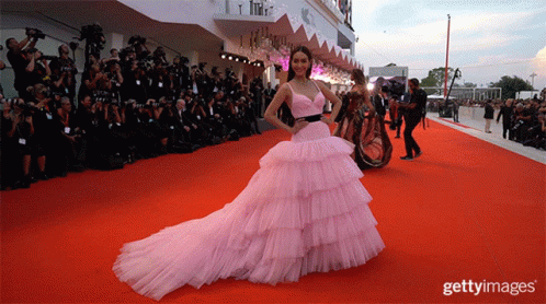 Woman in Pink Dress on Red Carpet Getty Images