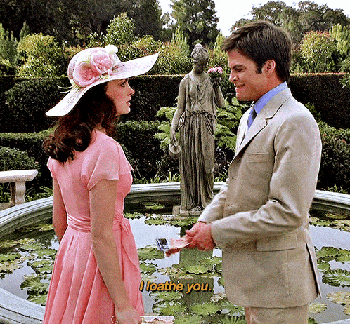 Woman in Pink Dress Saying I Loathe You