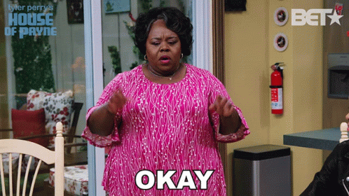 Woman in Pink Dress Says Okay