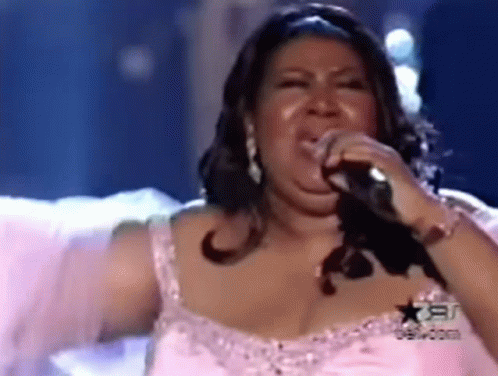 Woman in Pink Dress Singing Crying