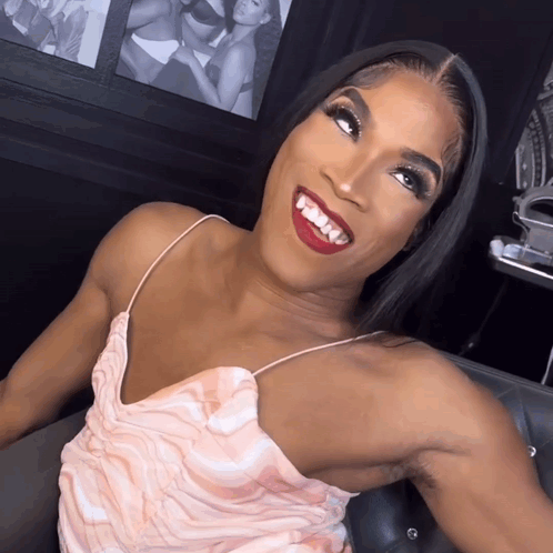 Woman in Pink Dress Smiling