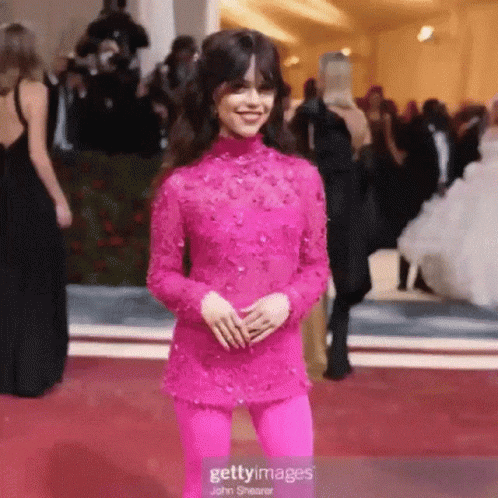Woman in Pink Dress Walking Red Carpet
