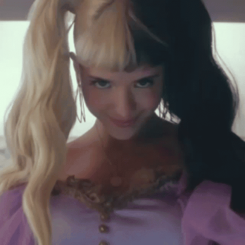 Woman in Pink Dress with Blonde and Black Hair