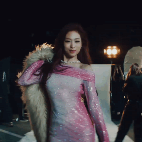 Woman in Pink Dress with Fur Collar