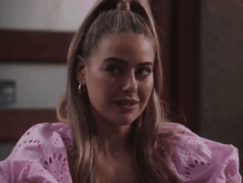 Woman In Pink Dress With Ponytail GIF