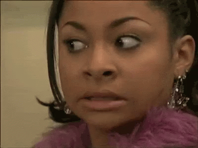 Woman In Pink Feather Boa Making Funny Face GIF