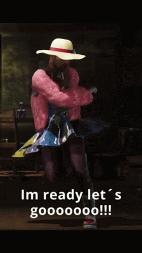 Woman in Pink Fur Coat and Rainbow Dress Says I'm Ready Let's Gooooooo