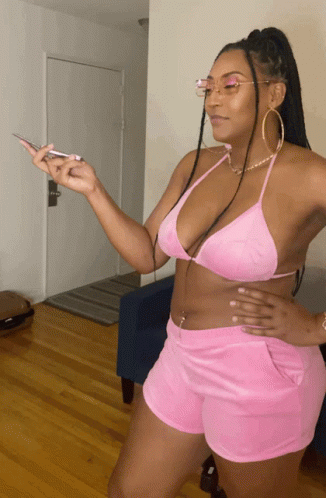 Woman In Pink Hang Up The Phone GIF