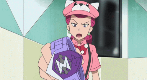 Woman in Pink Hat Holding Purple Cube