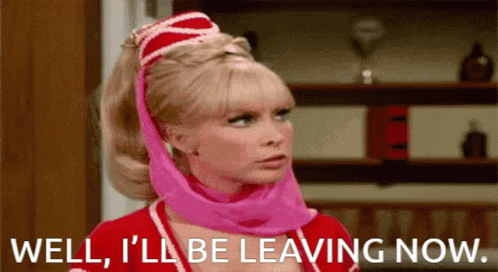 Woman in Pink Head Scarf and Red Hat Well I'll Be Leaving Now