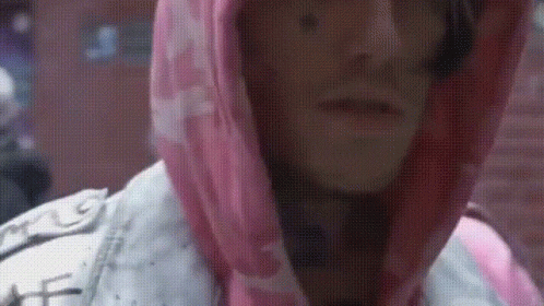 Woman In Pink Hoodie And White Jacket GIF