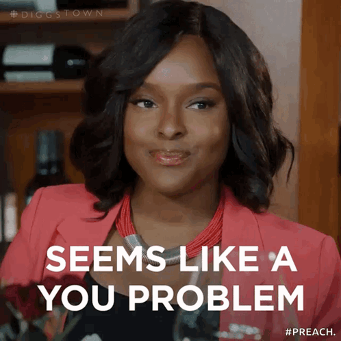 Woman in Pink Jacket and Red Necklace Says Seems Like a You Problem