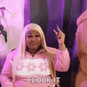 Woman in Pink Jacket Saying Clock It