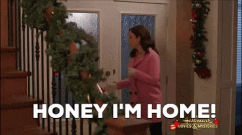 Woman in Pink Jacket Saying Honey I'm Home