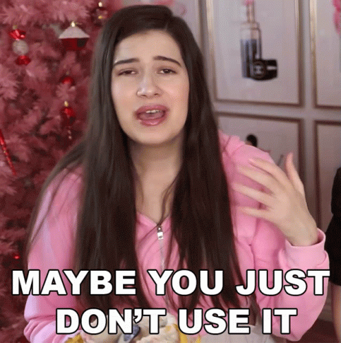 Woman In Pink Jacket Saying Maybe You Don't Use It GIF