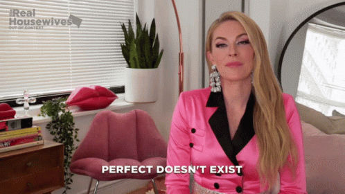 Woman In Pink Jacket Says Perfect Doesn't Exist GIF