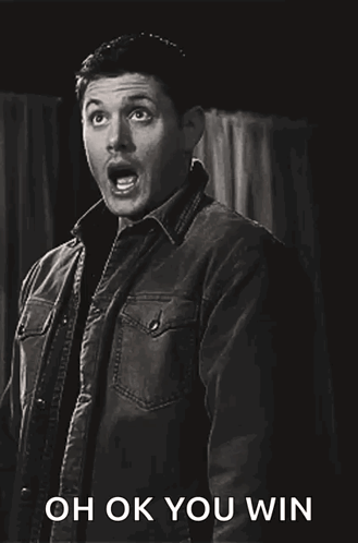 Woman in Pink Jacket Standing Before Rules