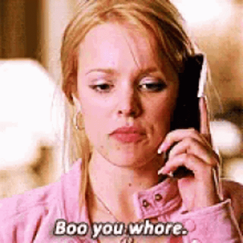 Woman in Pink Jacket Talking on Cell Phone Saying Boo You Whore