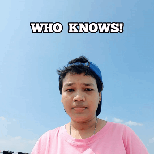 Woman in Pink Shirt and Blue Hat Who Knows