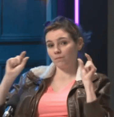Woman in Pink Shirt and Brown Leather Jacket Making Funny Face