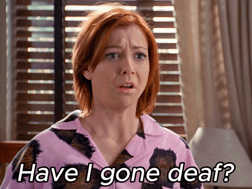 Woman in Pink Shirt Asking if She's Gone Deaf